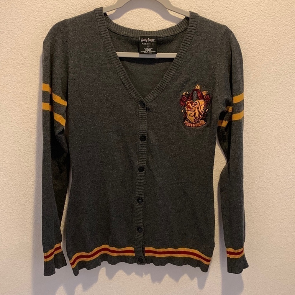 Harry Potter Womens Cardigan. Has feminine fit. Gryffindor Emblem to left chest.